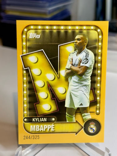Topps trading card featuring Real Madrid forward Kylian Mbappé, 244/325